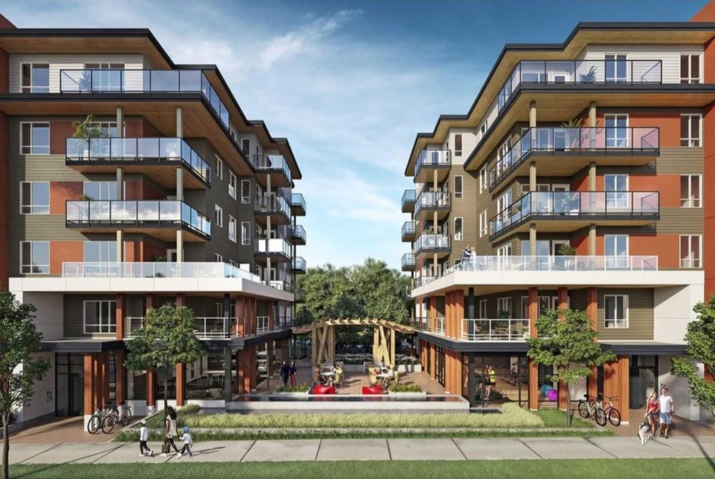 Architectural inspiration for Chatham-Kent, Ontario: mid-rise mixed-use wings around a central courtyard — homes above, street-level community and retail, pergola and landscaped green space — vision for Common Ground C.K.